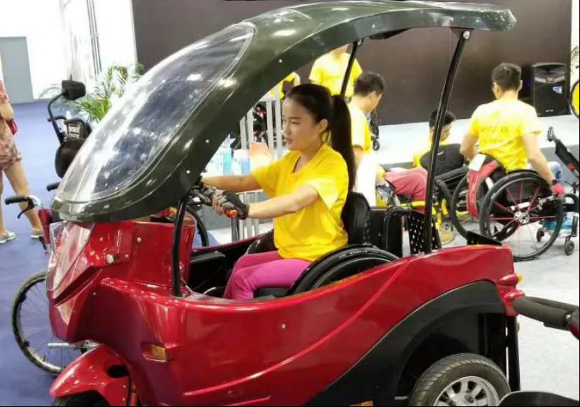Girl using Wheelchair Chariot