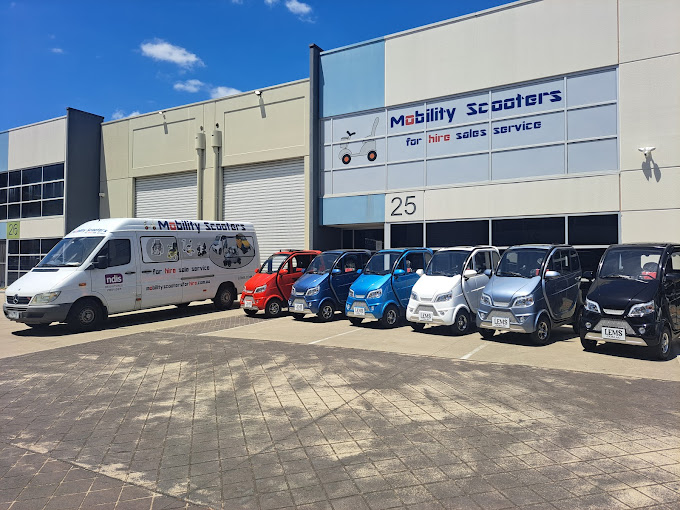 Factory 25 Front Entrance with Luxury Enclosed Mobility Scooters (LEMS) positioned out front